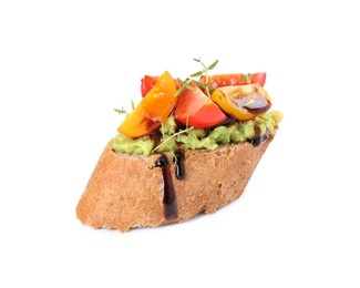 Photo of Delicious bruschetta with avocado, tomatoes and balsamic vinegar isolated on white