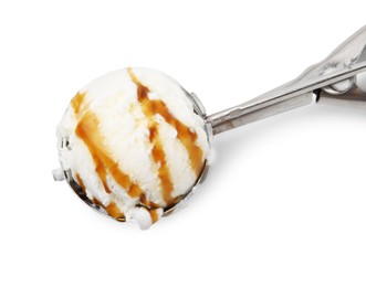 Steel scoop with tasty caramel ice cream isolated on white, above view
