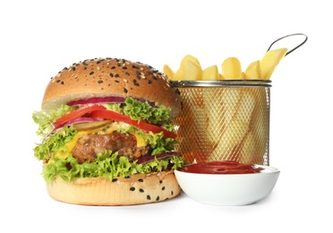 Photo of Burger with delicious patty, french fries and sauce isolated on white