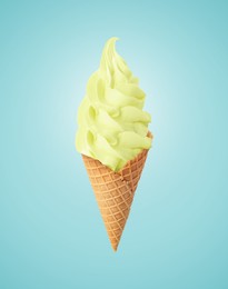 Tasty ice cream in waffle cone on pastel light blue background. Soft serve