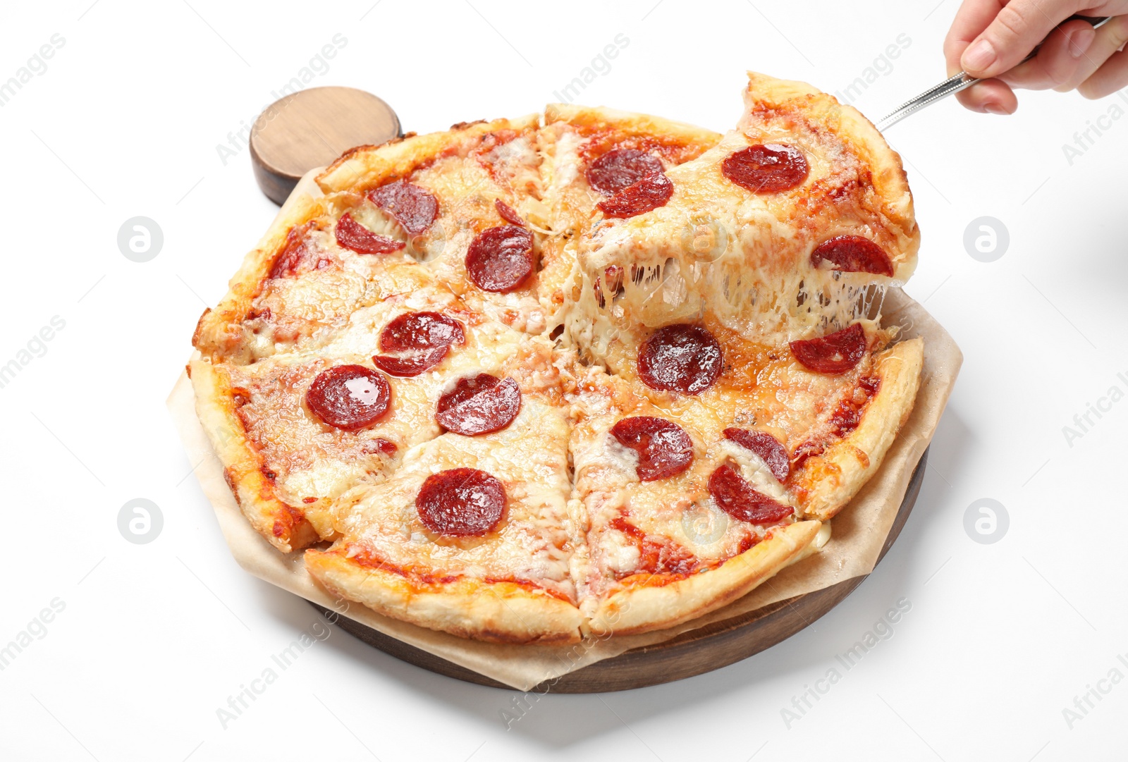 Photo of Woman taking slice of tasty pepperoni pizza on white background, closeup