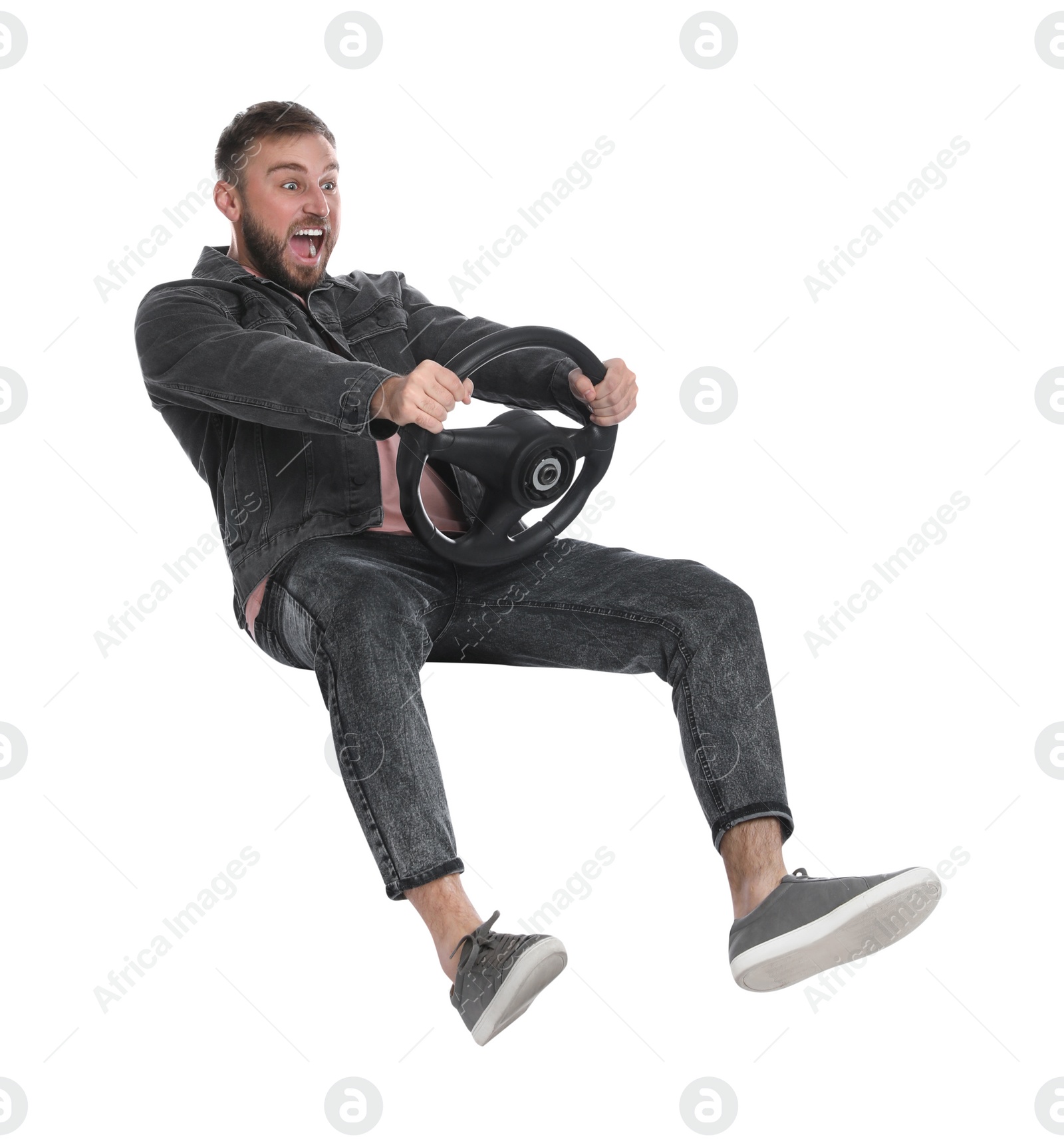 Photo of Emotional man with steering wheel against white background