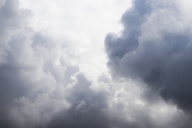 Sky with heavy rainy clouds on grey day