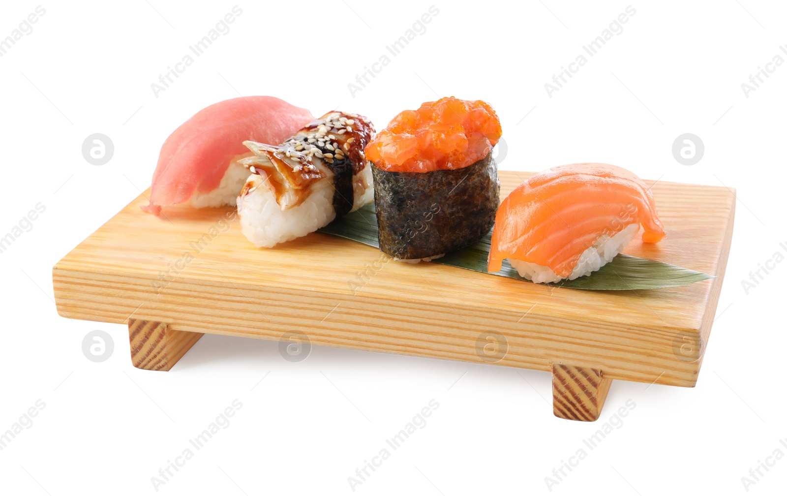Photo of Wooden tray with delicious nigiri sushi isolated on white
