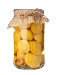 Photo of Jar with pickled pattypan squashes on white background