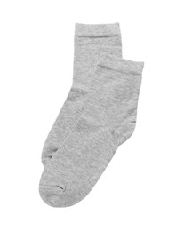 Photo of Pair of light grey socks isolated on white, top view