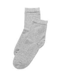 Pair of light grey socks isolated on white, top view