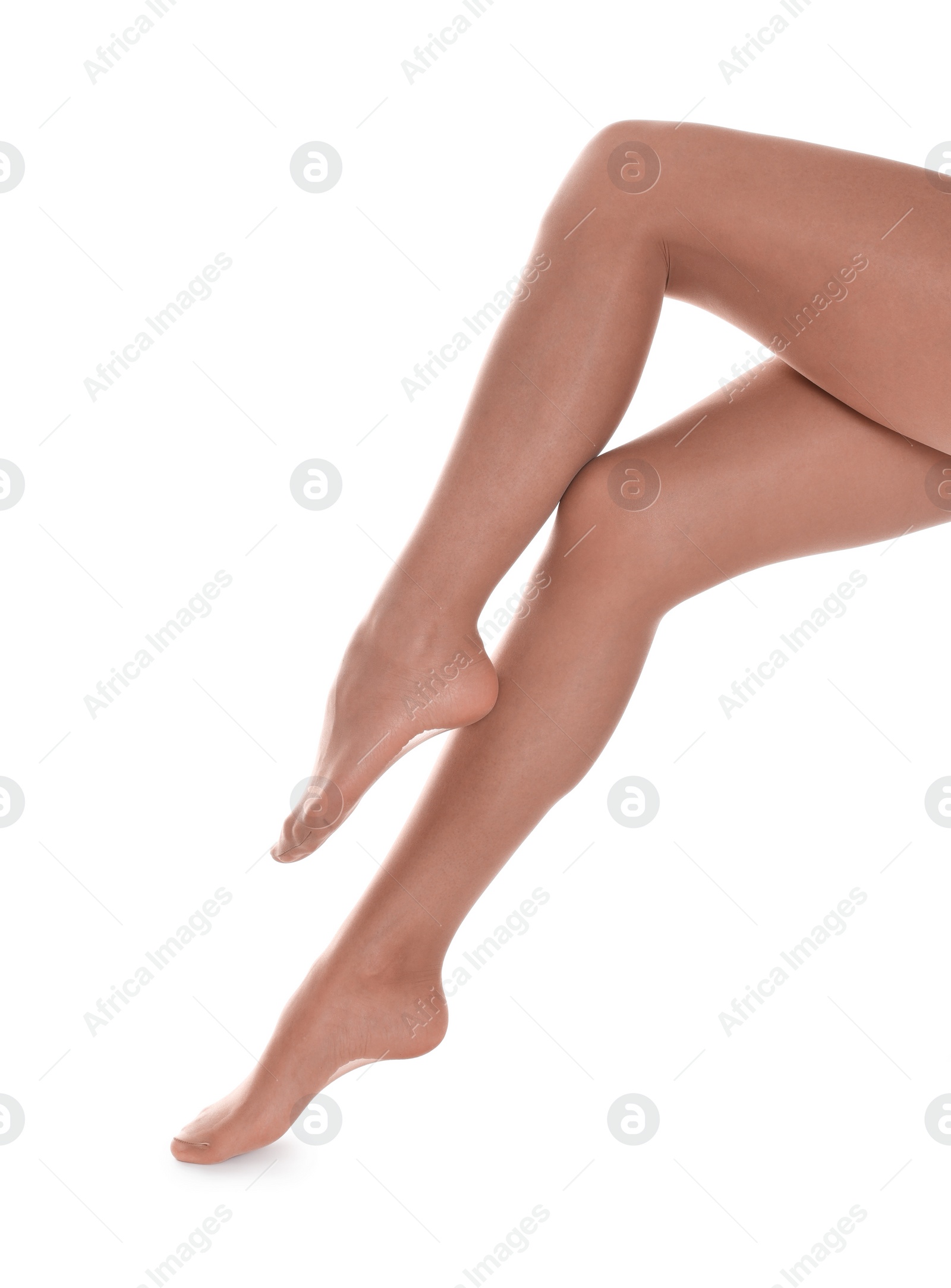 Photo of Woman with beautiful long legs wearing tights on white background, closeup