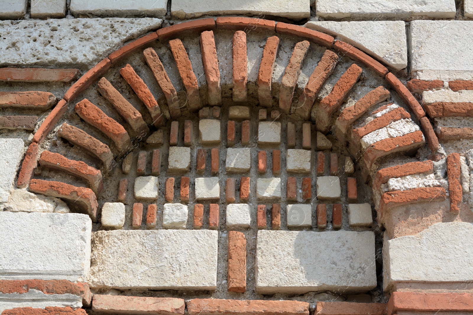 Photo of Beautiful stone wall with arch as background