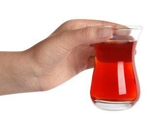 Photo of Woman holding glass of traditional Turkish tea on white background, closeup