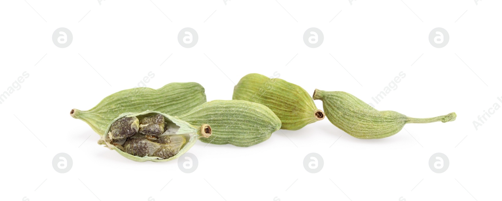 Photo of Pile of dry green cardamom pods isolated on white