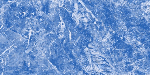 Wall paper design. Texture of blue marble as background, top view