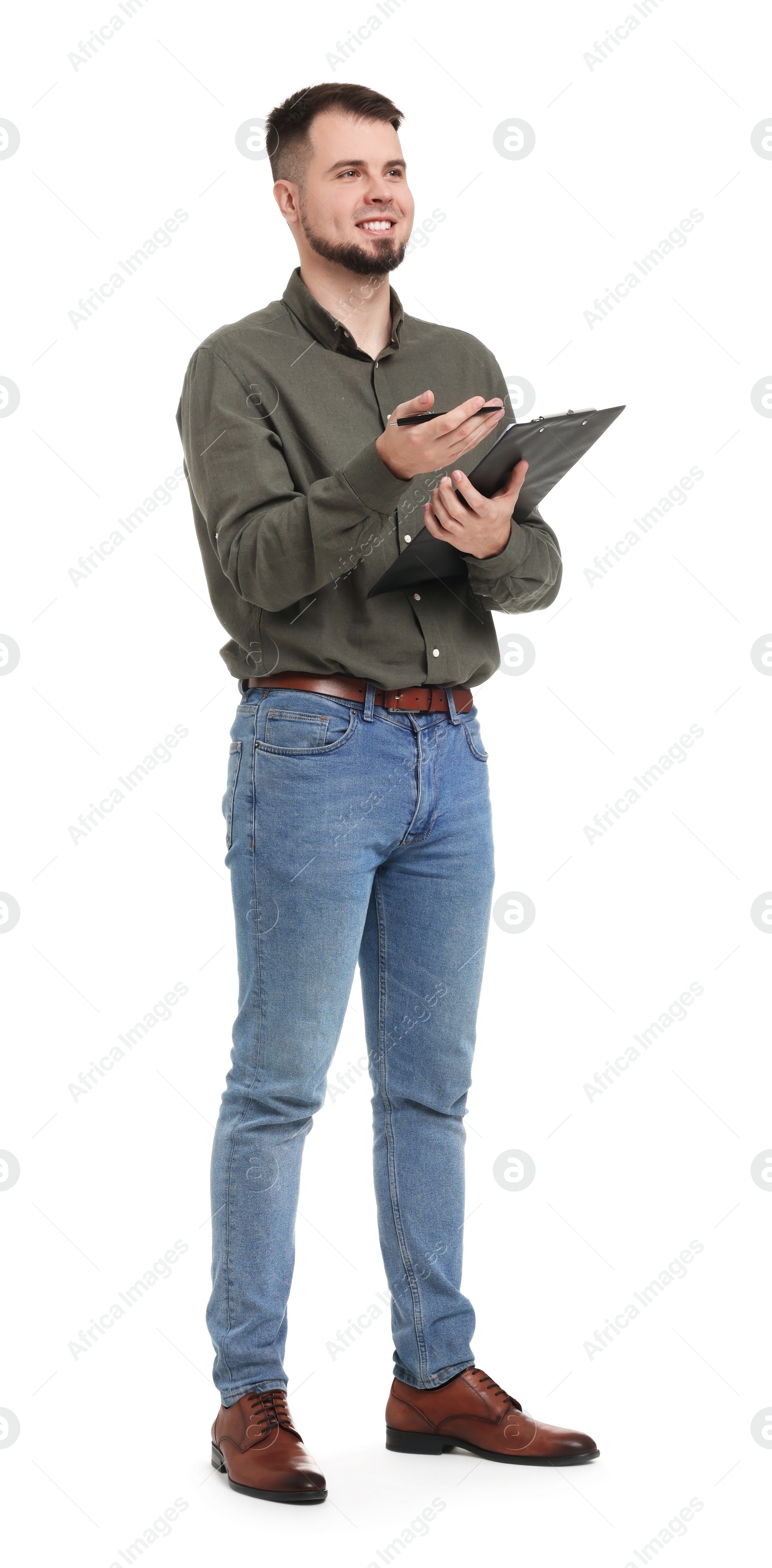 Photo of Man in shirt and jeans with clipboard on white background