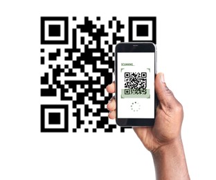 Image of African American man scanning QR code with smartphone on white background, closeup