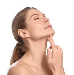 Photo of Woman massaging her face on white background