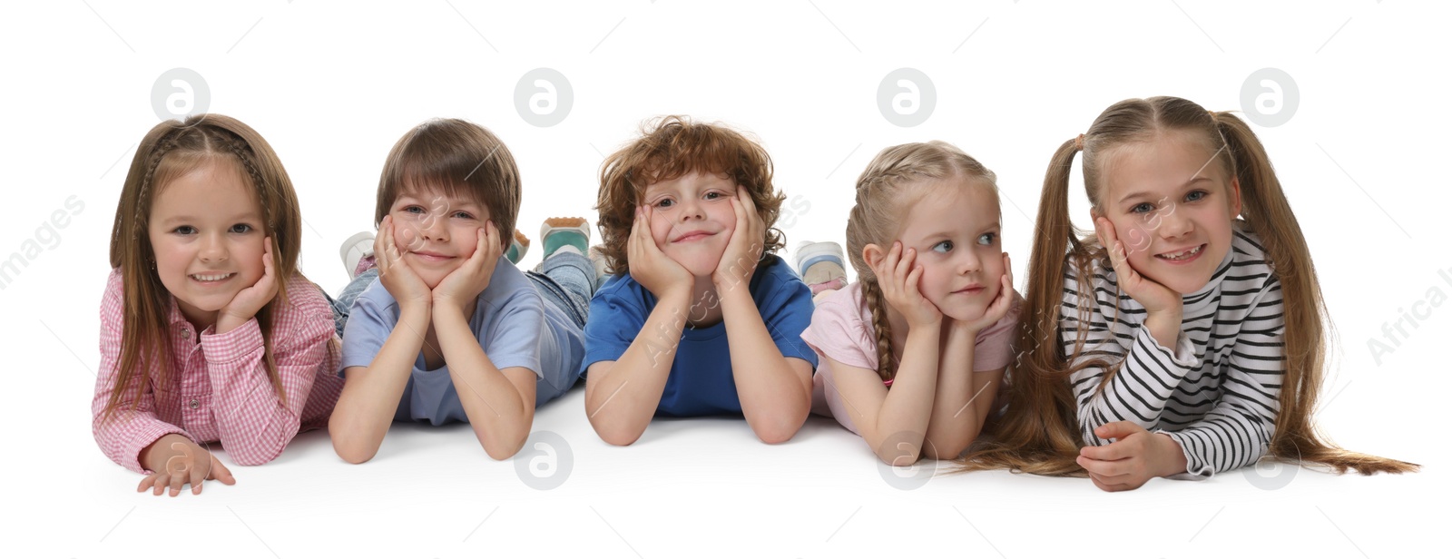 Photo of Group of cute children posing on white background