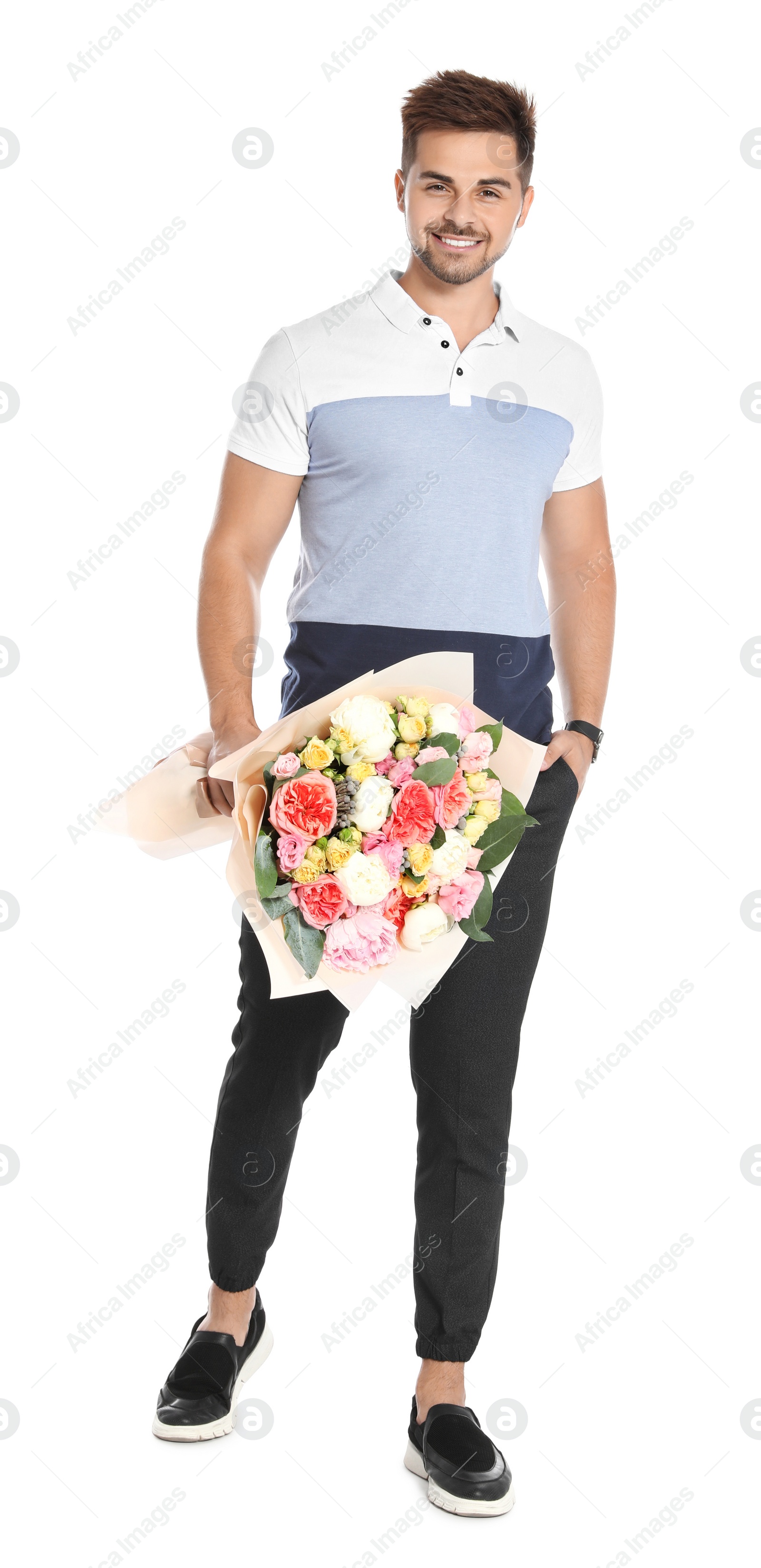 Photo of Young handsome man with beautiful flower bouquet on white background