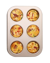 Photo of Freshly baked bacon and egg muffins with cheese in tin isolated on white, top view