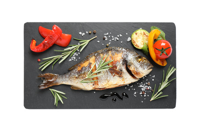Photo of Delicious roasted fish and vegetables isolated on white, top view