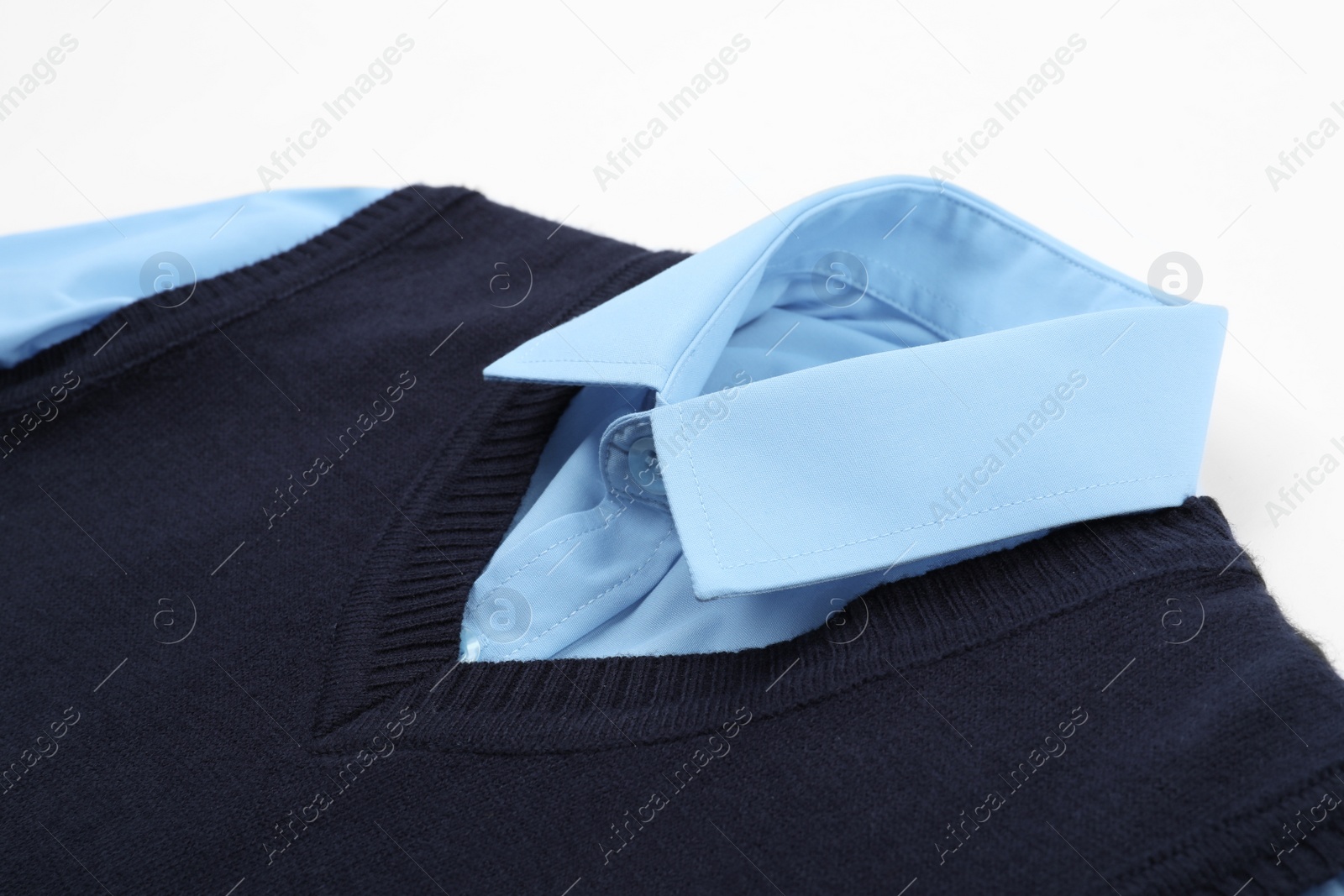 Photo of School uniform for boy on white background, closeup