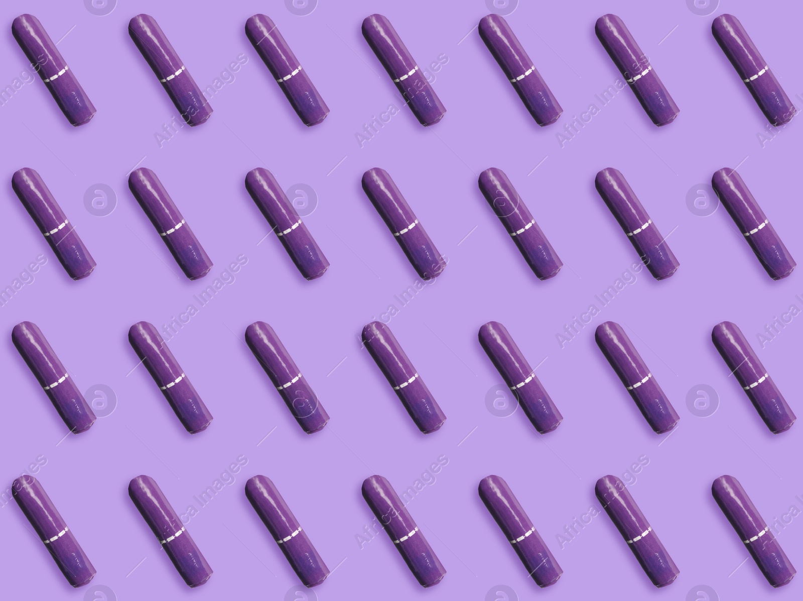 Image of Many tampons on violet background, flat lay 