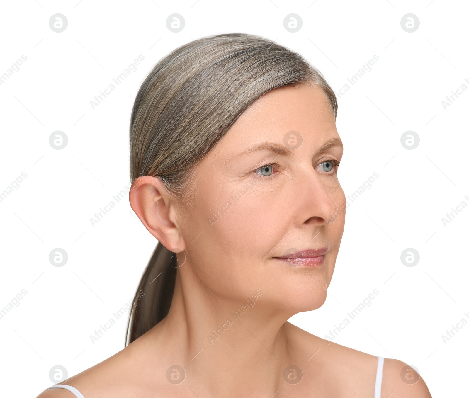 Photo of Portrait of senior woman with aging skin on white background. Rejuvenation treatment