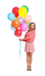 Young woman holding bunch of colorful balloons on white background