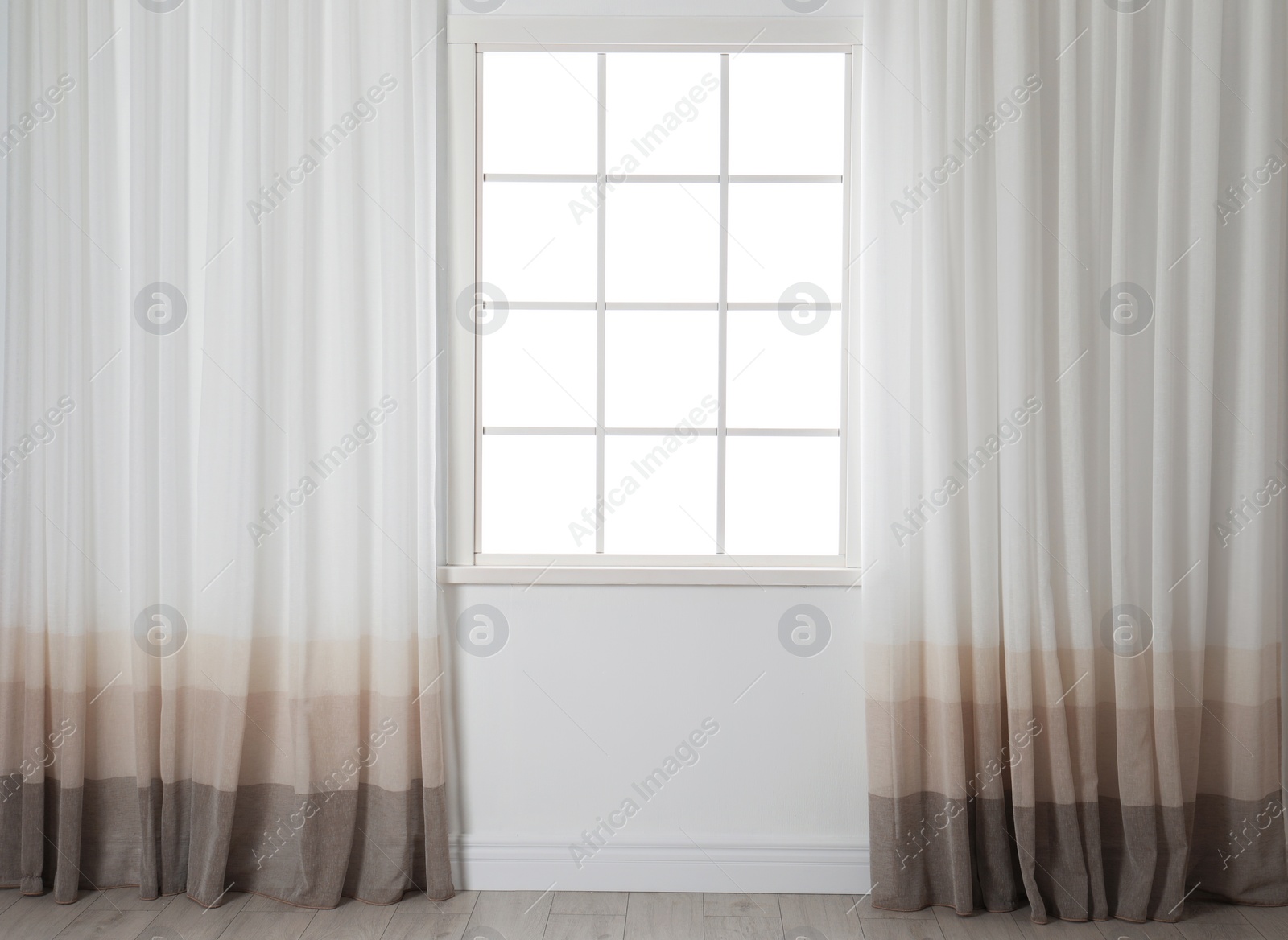 Photo of Modern window with curtains in living room. Home interior