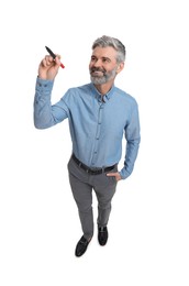 Mature businessman with marker on white background, above view