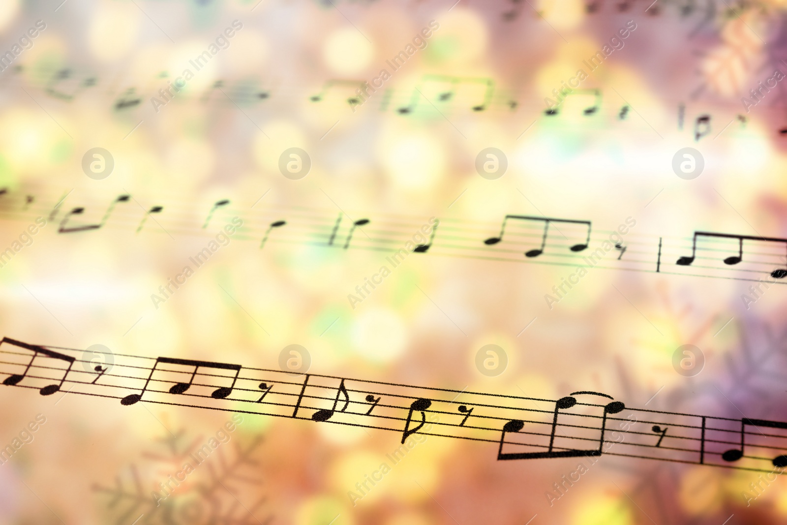 Image of Sheet with music notes as background, closeup. Christmas songs