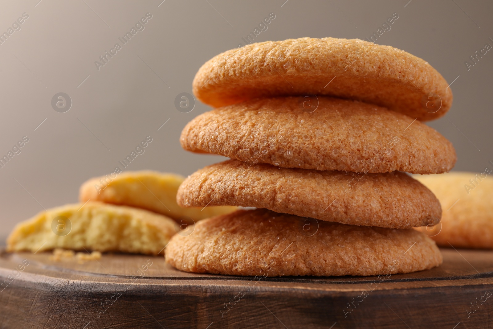 Photo of Delicious Danish butter cookies on wooden table, closeup