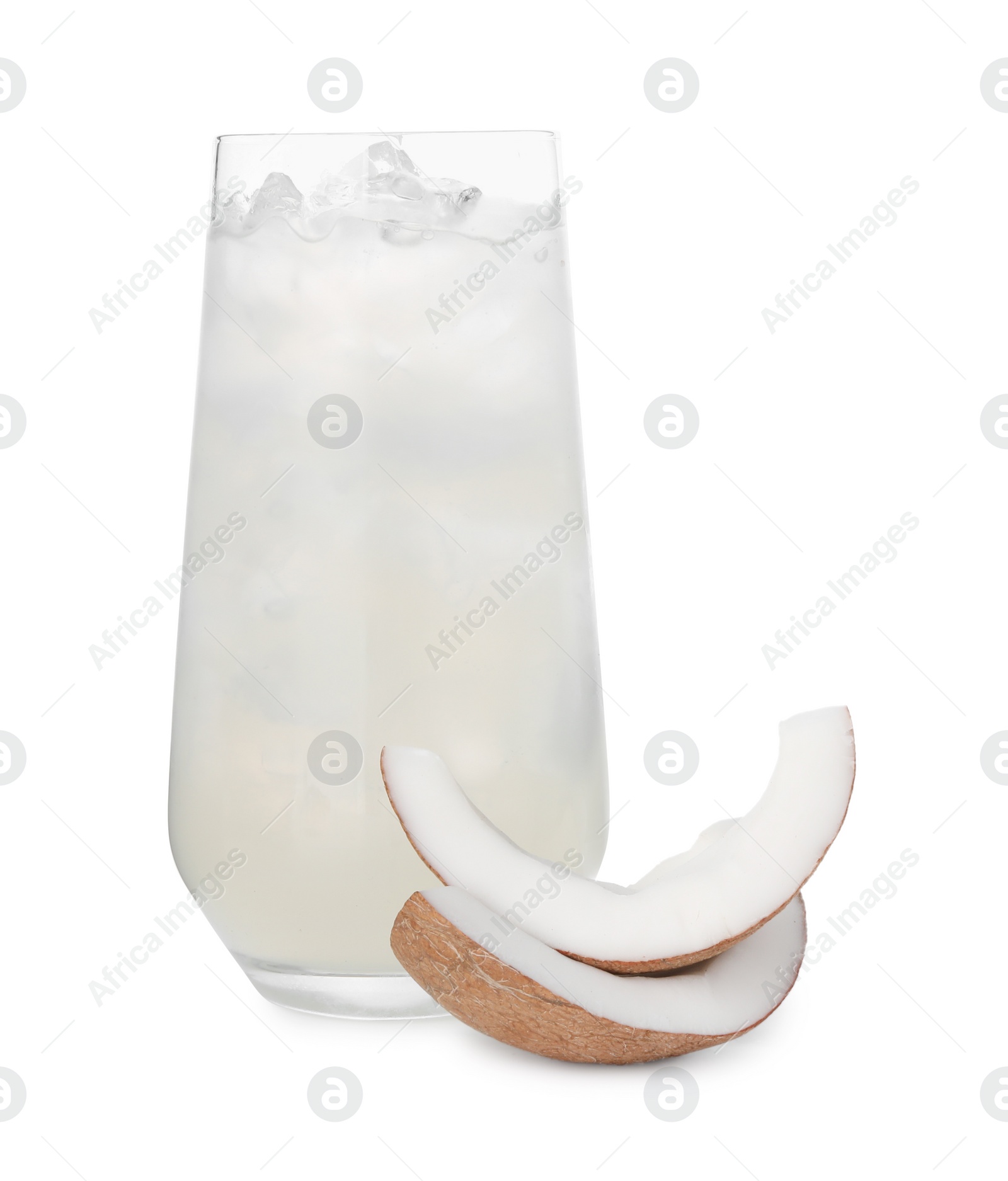 Photo of Glass of coconut water, ice cubes and nut isolated on white