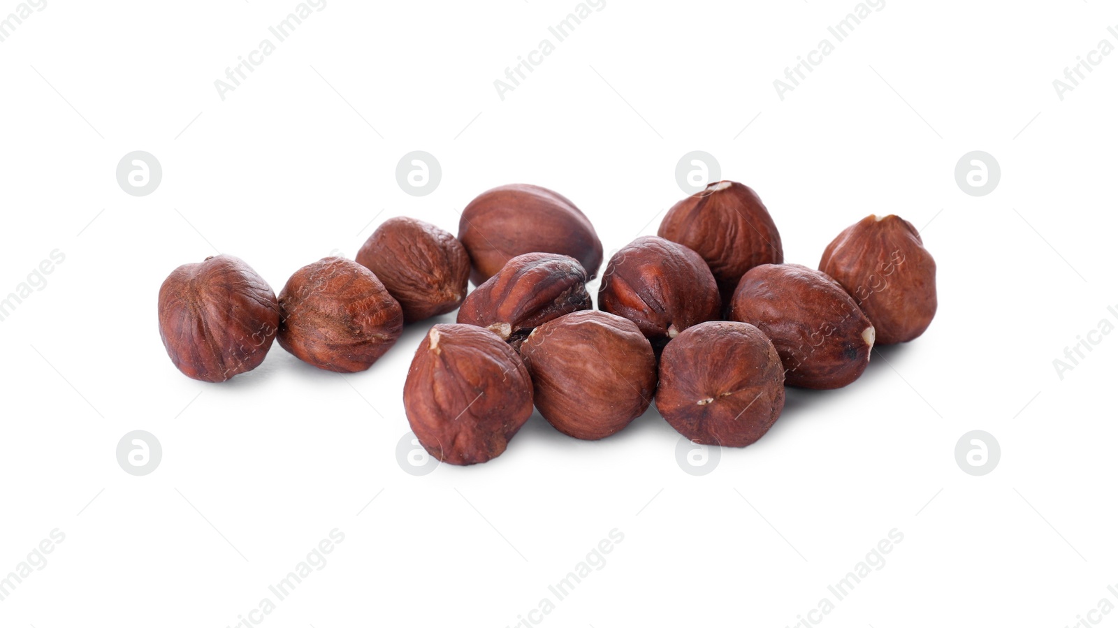 Photo of Heap of delicious hazel nuts isolated on white