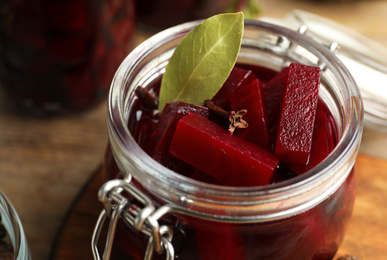 Delicious pickled beets in jar, closeup view