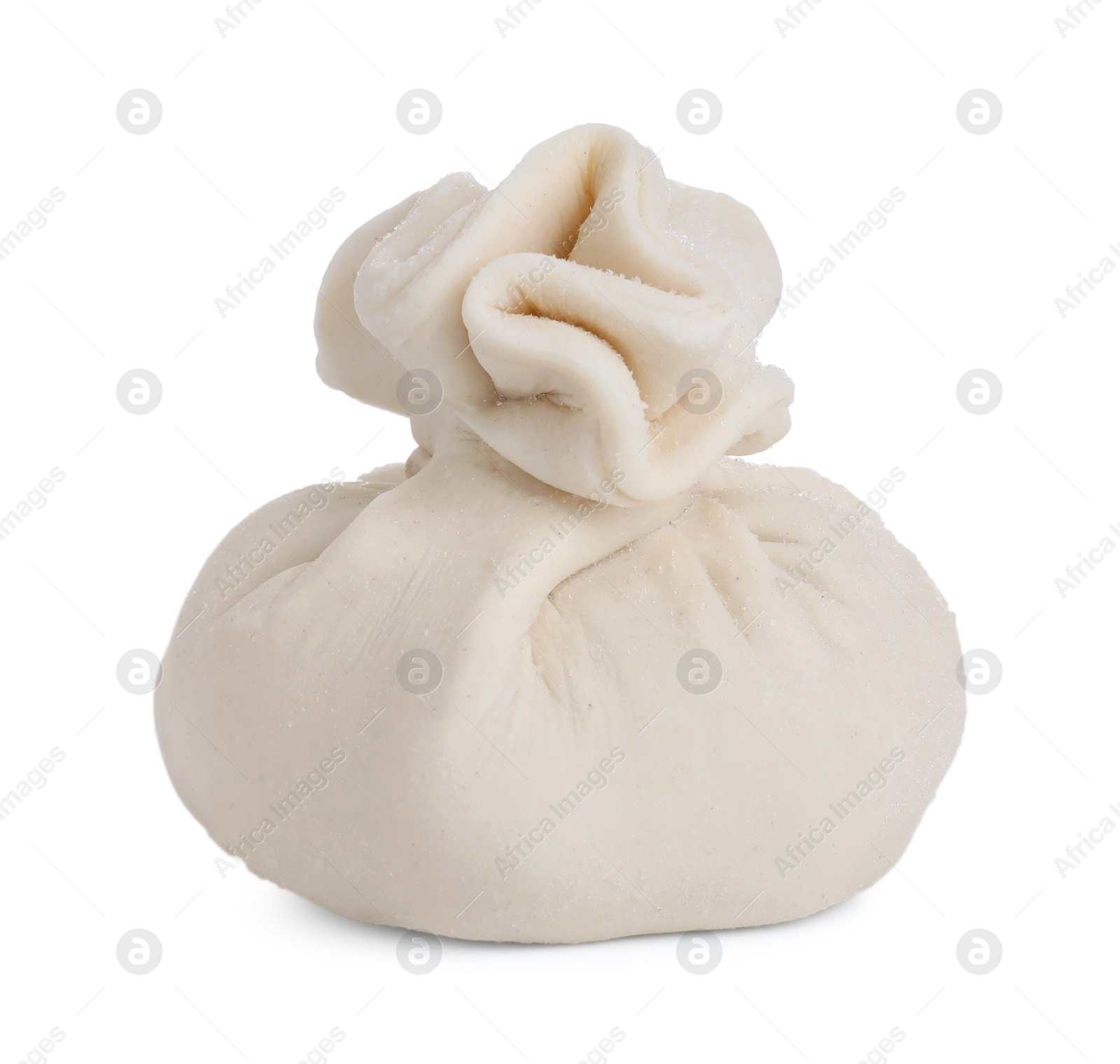 Photo of Uncooked khinkali (dumpling) isolated on white. Georgian cuisine