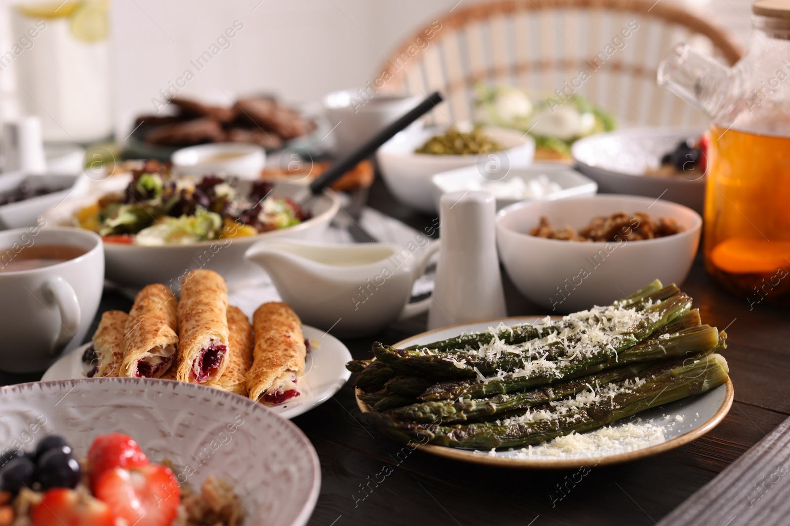 Photo of Many different dishes served on buffet table for brunch