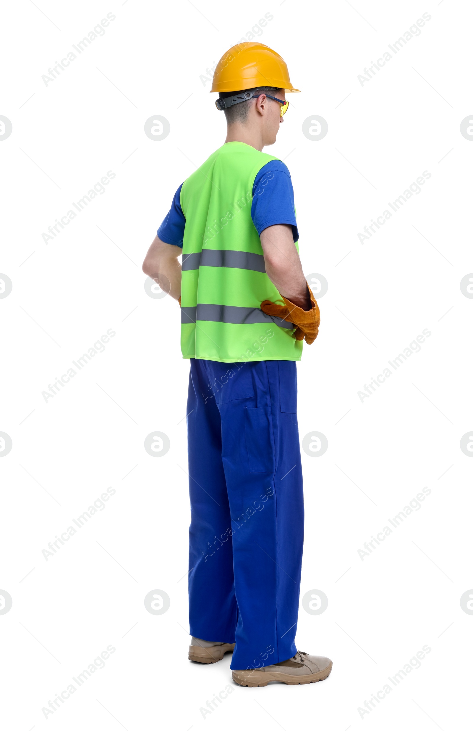 Photo of Young man wearing safety equipment on white background, back view