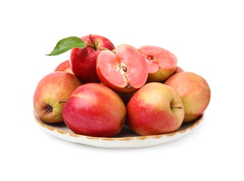 Photo of Plate of tasty apples with red pulp isolated on white