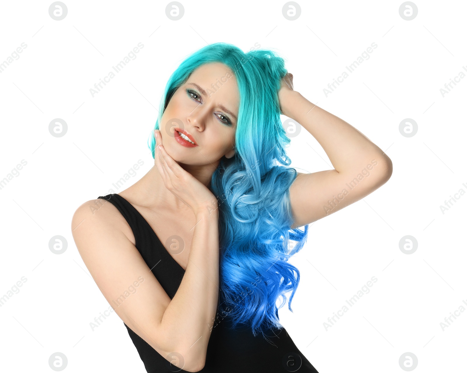 Image of Portrait of young woman with dyed long curly hair on white background