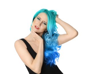 Portrait of young woman with dyed long curly hair on white background