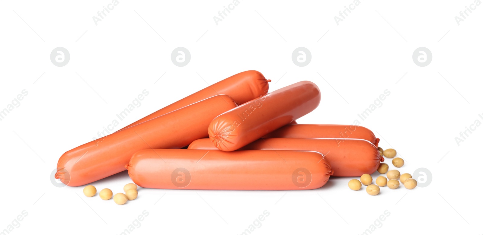 Photo of Raw vegetarian sausages and soybeans on white background