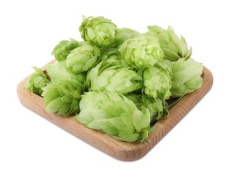 Photo of Many fresh green hops on white background