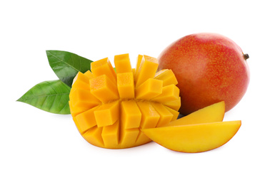 Whole and cut ripe mangoes isolated on white. Exotic fruit