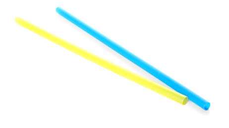 Photo of Color plastic cocktail tubes on white background