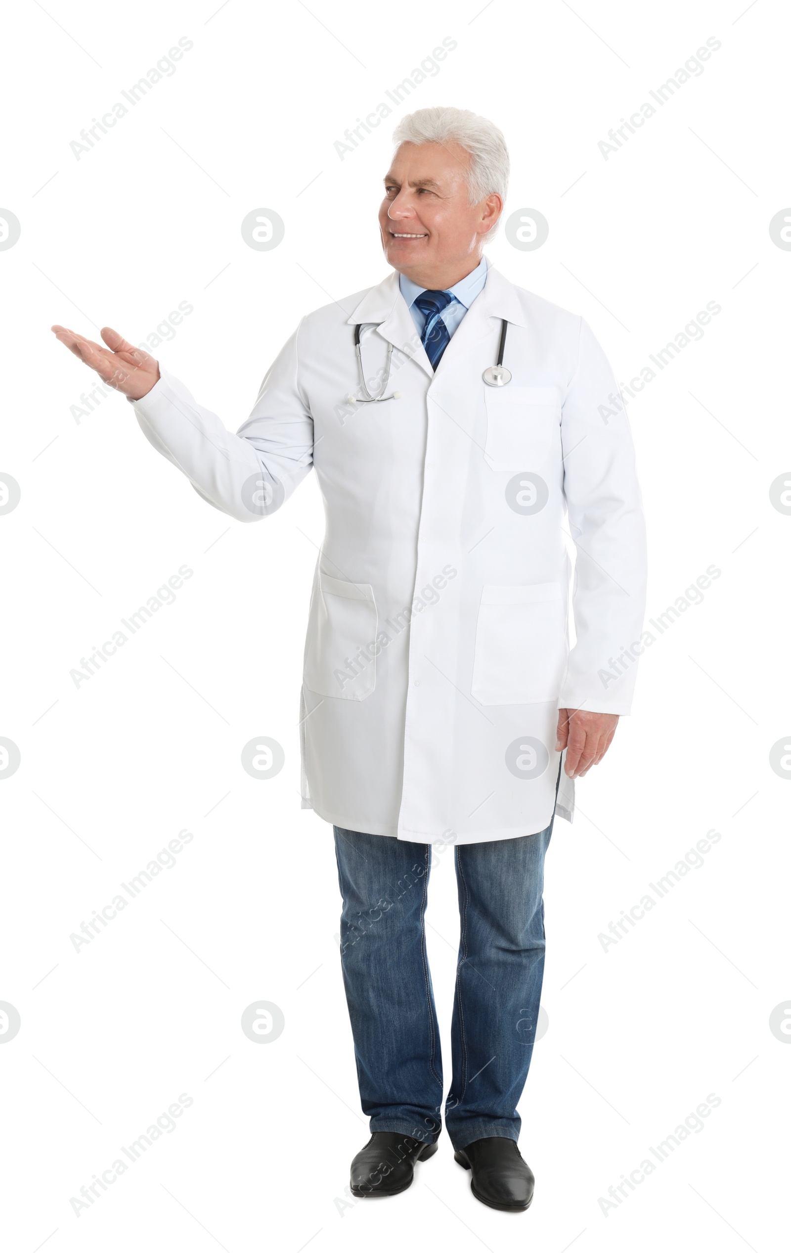 Photo of Full length portrait of senior doctor on white background