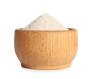 Whole wheat flour in wooden bowl on white background