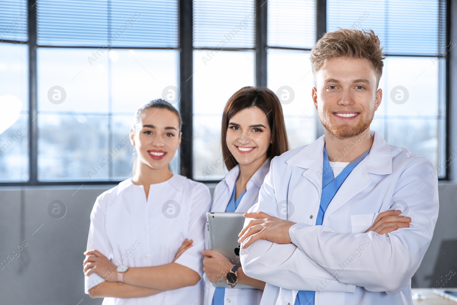 Photo of Smart medical student with his classmates in college