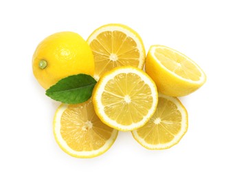 Photo of Fresh cut lemons with leaf on white background, top view