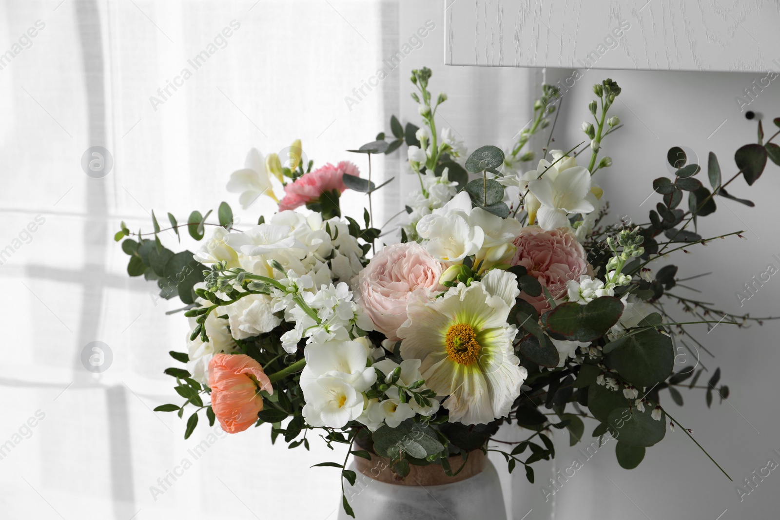 Photo of Beautiful bouquet of different fresh flowers indoors