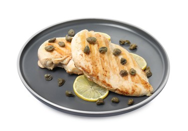 Photo of Delicious chicken fillets with capers and lemon isolated on white